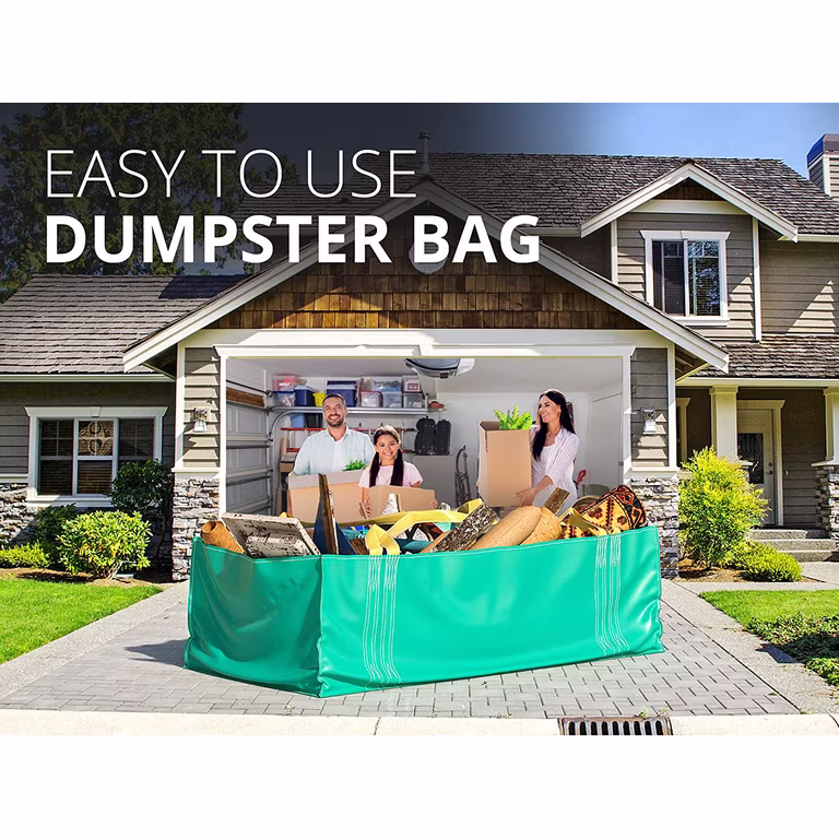 A family filling a waste bag with household cleanout items in a driveway